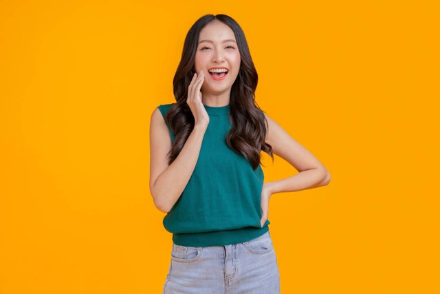Ilustrasi perempuan bahagia.
Foto: WHYFRAME/Shutterstock.