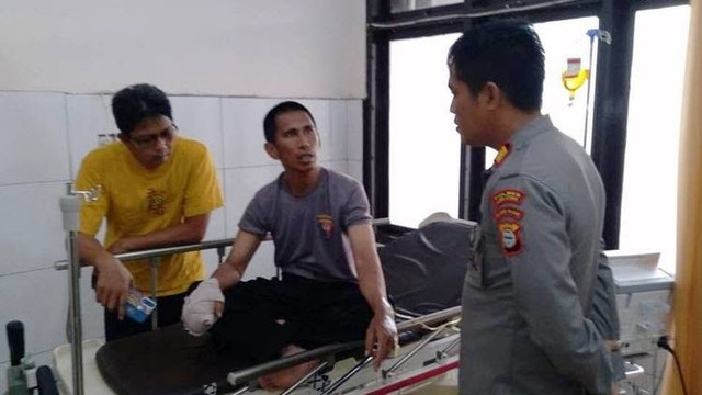 Anggota polisi di Luwu Utara (tengah) yang dibacok. Foto: Dok. Istimewa