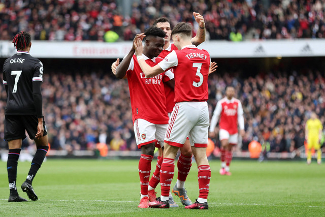 Selebrasi pemain Arsenal usai mencetak gol ke gawang Crystal Palace pada pertandingan lanjutan Liga Inggris di Stadion Emirates, London, Inggris, Minggu (19/3/2023).
Foto: David Klein/REUTERS