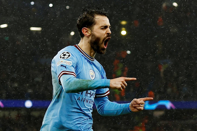 Pemain Manchester City Bernardo Silva merayakan gol kedua mereka saat hadapi Bayern Muenchen di Stadion Etihad, Manchester, Inggris, Selasa (11/4/2023). Foto: Action Images via Reuters/Jason Cairnduff