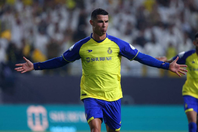 Cristiano Ronaldo merayakan gol kala Al Nassr bertandang ke markas Al Shabab dalam lanjutan Saudi Pro League 2022/23 di KSU Stadium, Riyadh, Arab Saudi, Rabu (24/5). Foto: Fayez Nureldine/AFP