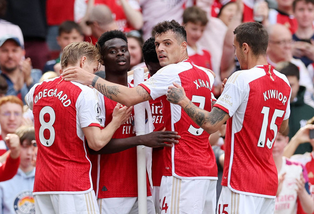 Selebrasi pemain Arsenal saat melawan Wolves dalam laga pekan terakhir Liga Inggris 2022/23 di Stadion Emirates pada 28 Mei 2023. Foto: REUTERS/David Klein