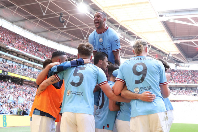 Pemilu Manchester City Ilkay Gundogan merayakan gol kedua mereka bersama rekan setimnya saat hadapi Manchester United di Stadion Wembley, London, Inggris, Sabtu (3/6/2023). Foto: Carl Recine/REUTERS