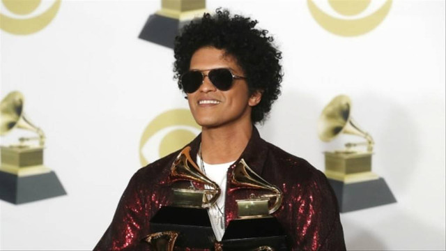 Penyanyi Bruno Mars. Foto: REUTERS/Carlo Allegri
