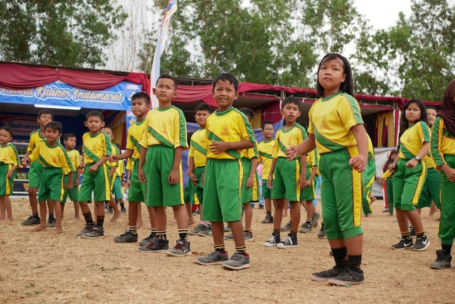Ilustrasi Anak Sekolah Senam Menggunakan Lagu Gemu Famire. Foto: Shutterstock