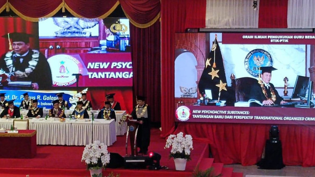 Pengukuhan Kepala BNN Komjen Petrus Reinhard Golose sebagai Guru Besar STIK. Foto: Thomas Bosco/kumparan