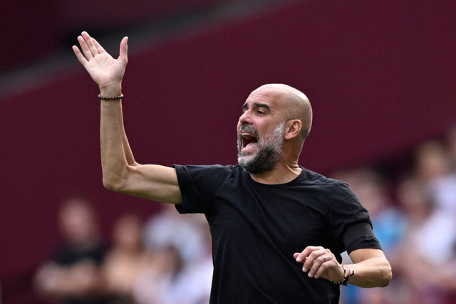 Manajer Manchester City Pep Guardiola pada pertandingan West Ham United vs Manchester City di Stadion London, London, Inggris, Sabtu (16/9/2023). Foto: Tony Obrien/REUTERS