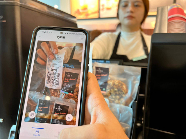 Ilustrasi transaksi QRIS Bank Mandiri. Dok Bank Mandiri