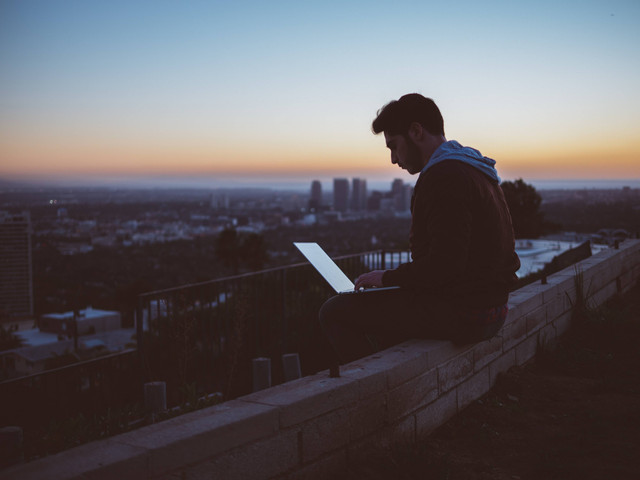 https://unsplash.com/photos/man-sitting-on-concrete-brick-with-opened-laptop-on-his-lap-Z3ownETsdNQ