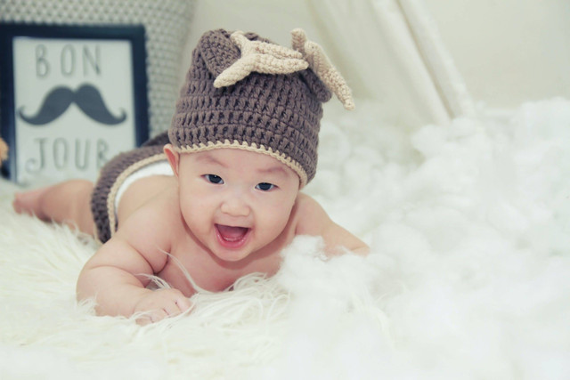 Pada usia 3 bulan menuju 4 bulan, perkembangan bayi  mengalami kemajuan pesat yang perlu diamati. Foto: Pexels.com