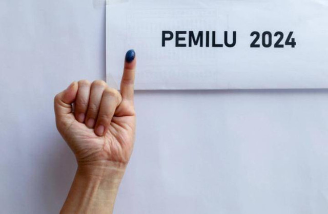 Ilustrasi tinta di jari usai ikut Pemilu 2024. Foto: Shutterstock