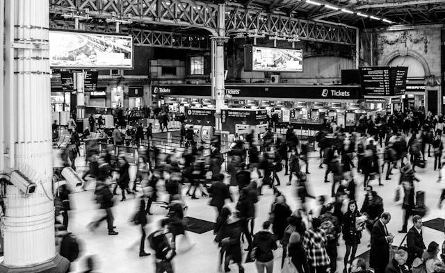 People and Life by https://www.pexels.com/photo/grayscale-photography-of-people-walking-in-train-station-735795/