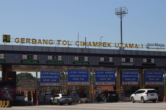 Suasana di Gerbang Tol Cikampek Utama, Rabu (20/3/2024).  Foto: Dicky Adam Sidiq/kumparan