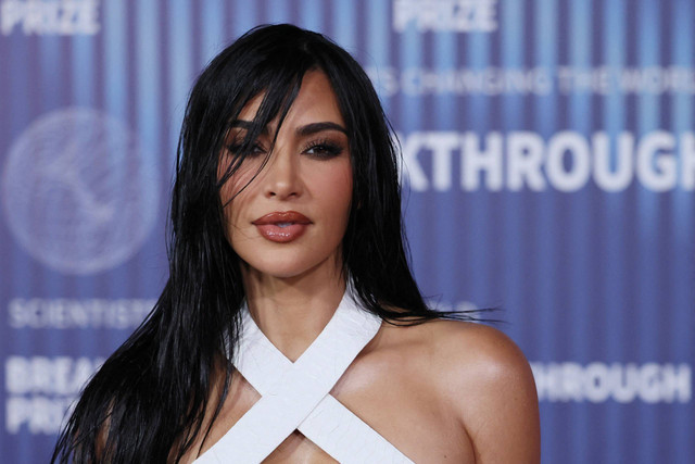 Kim Kardashian ungkap kebiasaan uniknya yang selama ini hanya jadi rumor. Foto: AFP/Etienne Laurent