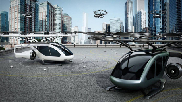 Konseptual eVTOL (electric vertical take-off and landing) pesawat sebagai layanan taksi / antar-jemput di helipad di atas bangunan (Sumber: https://www.istockphoto.com/id/foto/konseptual-evtol-pesawat-sebagai-layanan-taksi-antar-jemput-di-helipad-di-atas-gm1394967815-450245371?searchscope=image%2Cfilm