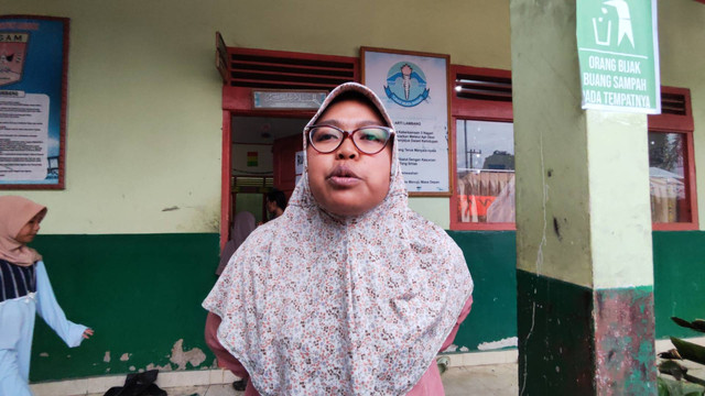 Erma, warga Nagari Bukik Batabuah, Kabupaten Agam, korban banjir lahar dingin. Foto: Jonathan Devin/kumparan