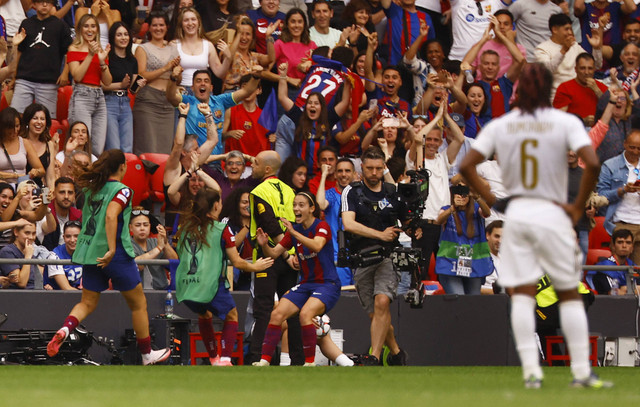 Aitana Bonmati selebrasi usai mencetak gol ke gawang Lyon di final Liga Champions Wanita 2024.  Foto: Susana Vera/Reuters