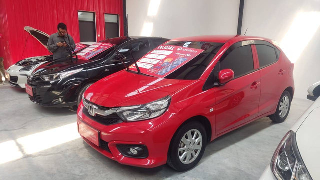 Mobil bekas di platform Caroline. Foto: Aditya Pratama Niagara/kumparan