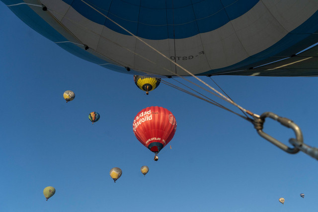 Ilustrasi Balon udara. Foto: MANAURE QUINTERO/AFP