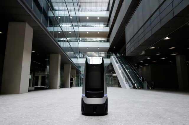 Ilustrasi robot pelayan. Foto: REUTERS/Heo Ran