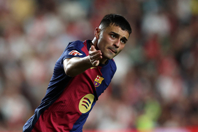 Pedri Gonzalez berselebrasi saat Rayo Vallecano vs Barcelona dalam laga pekan ketiga Liga Spanyol 2024/25 di Estadio de Vallecas, Rabu (28/8) dini hari WIB. Foto: REUTERS/Violeta Santos Moura