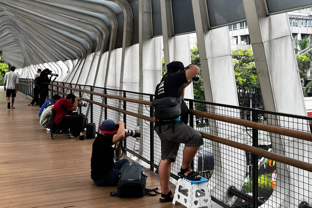 Fotografer di CFD Jakarta, Minggu (8/12/2024). Foto: Rayyan Farhansyah/kumparan
