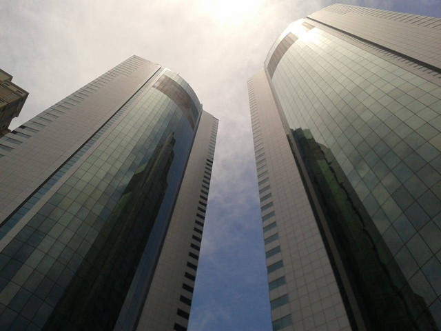 Ilustrasi gedung perusahaan Perseroan Terbatas (PT). Foto: Unsplash