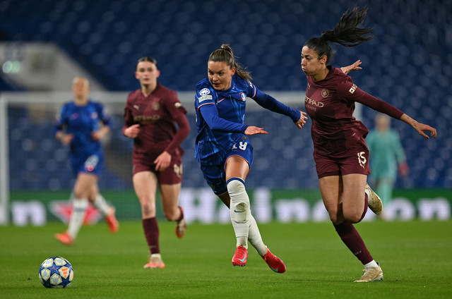 Chelsea menang 3-0 atas Manchester City di leg 2 perempat final Liga Champions Wanita, Jumat (28/3). Foto: GLYN KIRK / AFP