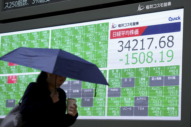 Ilustrasi Bursa Saham Asia. Foto: Kazuhiro Nogi/AFP