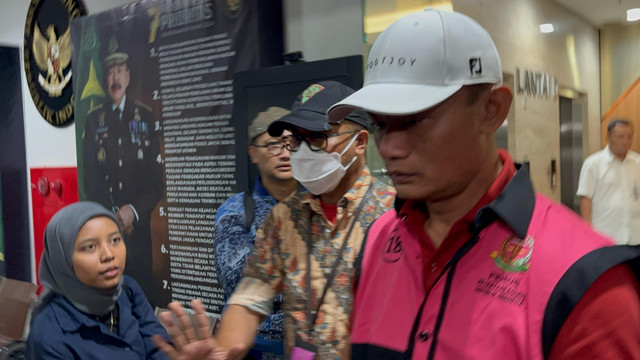 Ketua PN Jaksel, Muhammad Arif Nuryanta ditangkap Kejagung RI, Sabtu (13/4). Foto: Abid Raihan/kumparan