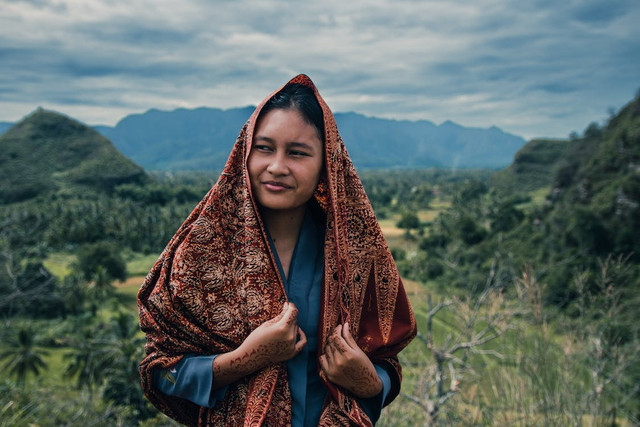 Pakaian adat Sumatera Barat,Pexels/Ihsan Adityawarman