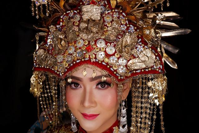 Pakaian adat Lampung,Pexels/Helen Bridal