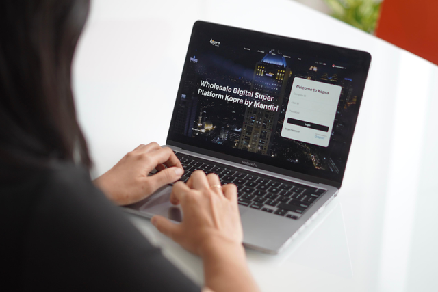 Bank Mandiri hadirkan Kopra by Mandiri dalam mempermudah mempermudah implementasi penempatan Devisa Hasil Ekspor (DHE) dari Sumber Daya Alam (SDA). Foto: Dok. Bank Mandiri