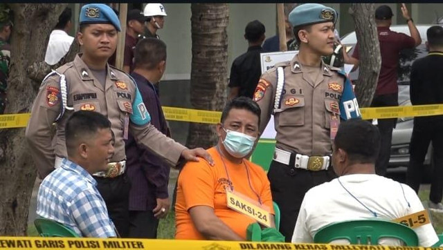 Aiptu K, anggota Polisi Polda Sumatera Selatan yang merupakan tersangka kasus perjudian. | Foto: Sinta Yuliana/Lampung Geh