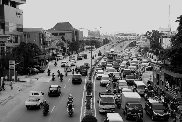 Wisata di Plaju Palembang. Foto pemandangan Kota Palembang. Sumber: Unsplash/Ujuk Safar