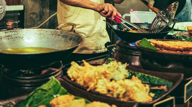 cooking dishes in traditional kitchen. unsplash.com