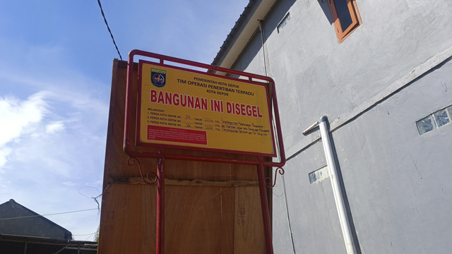 Suasana di perumahan Al-Fatih, Sawangan, Depok, yang sempat disegel Satpol PP karena belum mengantongi IMB, Kamis (24/4/2025). Foto: Thomas Bosco/kumparan