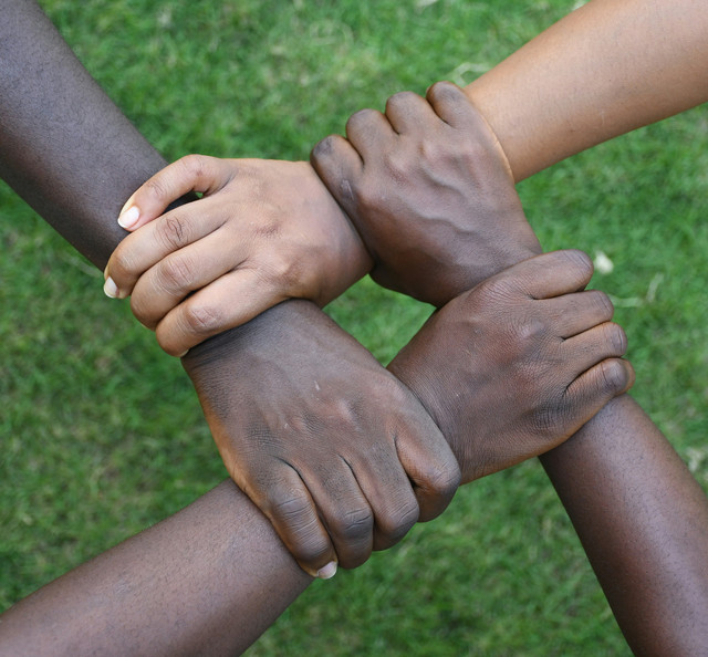 https://unsplash.com/photos/a-group-of-hands-holding-each-other-Q6KzWe-lq9Y