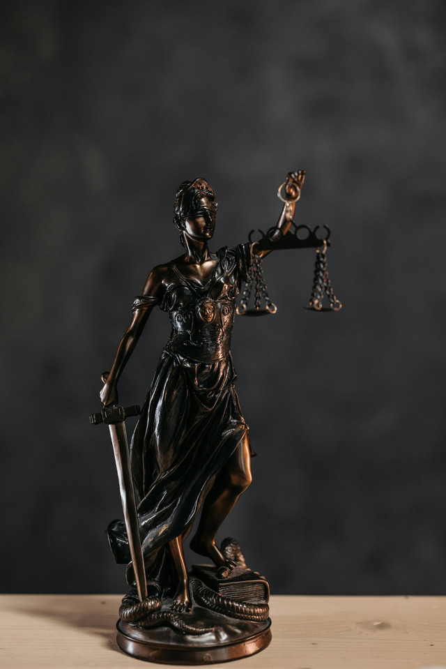 Photo by Pavel Danilyuk: https://www.pexels.com/photo/close-up-photo-of-a-lady-justice-statuette-8112193/