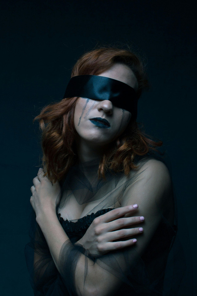 Photo by Ellen Araujo: https://www.pexels.com/photo/woman-wearing-black-sweetheart-neckline-dress-with-black-blindfold-1845827/