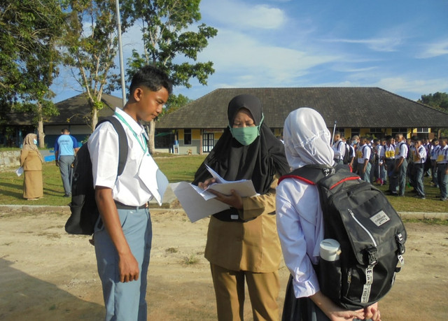 Ilustrasi Cara Lapor Diri PPG Guru Tertentu 2025 Sumber Unsplash/Fajar Herlambang