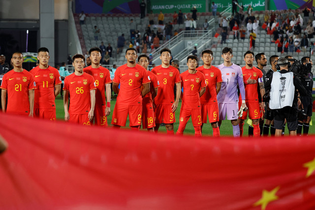 Pemain Timnas China saat melawan Tajikistan pada pertandingan Grup A Piala Asia di Stadion Abdullah bin Khalifa di Doha pada 13 Januari 2024. Foto: Karim Jaafar/AFP