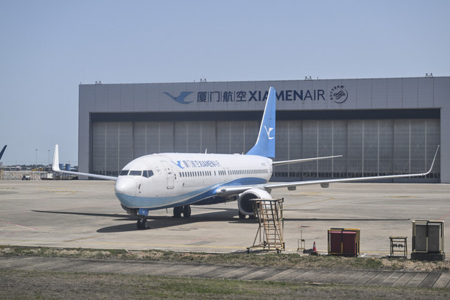Pesawat Xiamen Airlines. Foto: Hector Retamal/AFP
