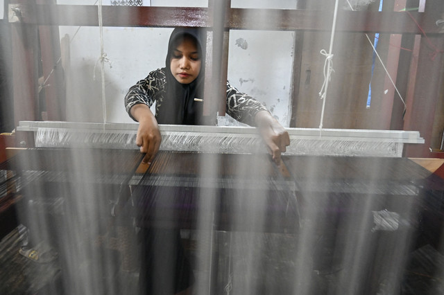 Ilustrasi perempuan pedesaaan Indonesia. Foto: AFP