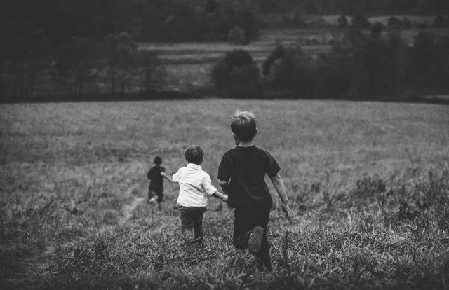 childhood https://unsplash.com/photos/three-boys-running-on-field-b8rkmfxZjdU