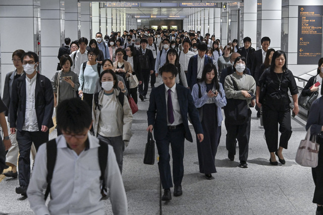 Ilustrasi pekerja di Jepang. Foto: Richard A. Brooks/AFP
