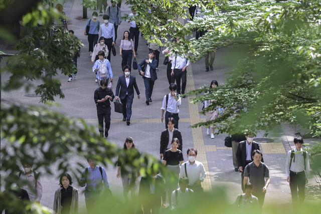 Ilustrasi pekerja di Jepang. Foto: Richard A. Brooks/AFP