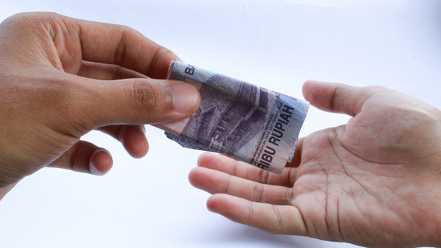 Ilustrasi pungutan liar. Foto: Shutterstock