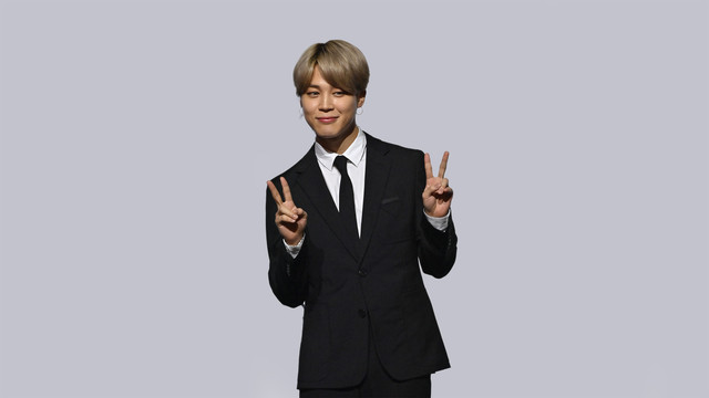 Anggota boy band K-pop Korea Selatan BTS, Jimin, berpose untuk sesi foto dalam konferensi pers album baru BTS 'BE (Deluxe Edition)' di Seoul pada 20 November 2020. Foto: Jung Yeon-je / AFP