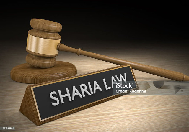 Sumber https://www.istockphoto.com/id/bot-wall?returnUrl=%2Fid%2Ffoto-foto%2Fsyariat-islam.